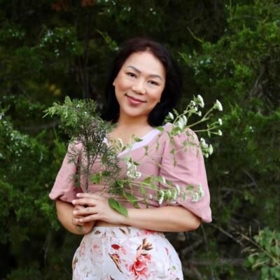 Levi Sap Nei Thang holding Wild Flowers